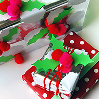 Pom pom holly gift wrap