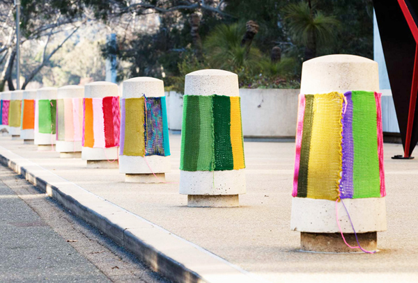Knitta sidewalk via the red thread