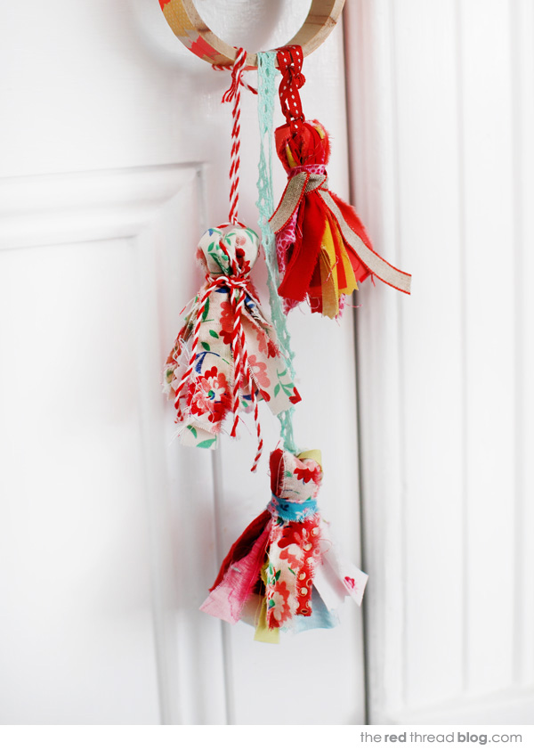 the red thread fabric tassels hanging