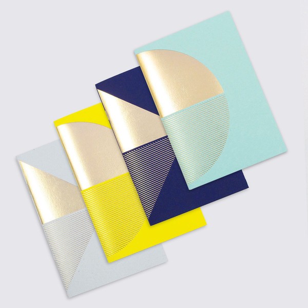 Metalic brass foil notebooks by Tom Pigeon, via we-are-scout.com.