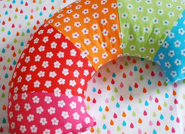 Sew a bright ranbow pillow - tutorial via We Are Scout