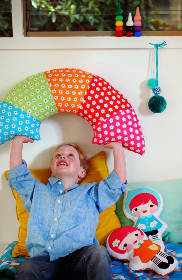 Sew a bright ranbow pillow - tutorial via We Are Scout