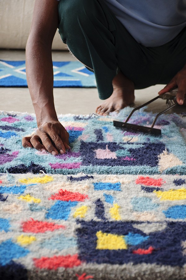 Production of Floor Story rugs in India.