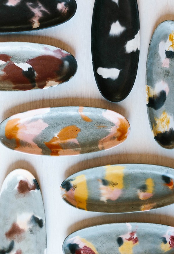 Concrete oval platters by Fox and Ramona.