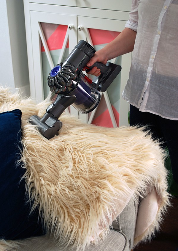 The Dyson DC54 is perfect for keeping dust mite populations under control in my fluffy throw rug.