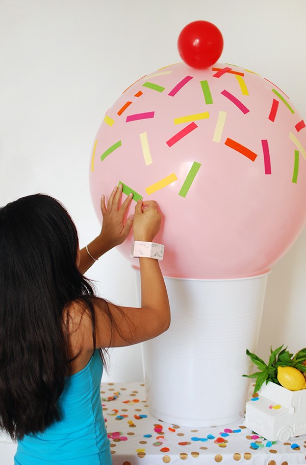 Use Target's $12 giant plastic cup stool as an ice cream party decoration. 