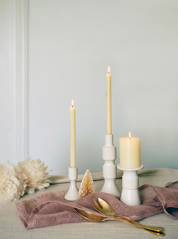 How to set your table for Christmas with a mid-century inspired rosy-gold theme. Photo by Lisa Tilse for We Are Scout.