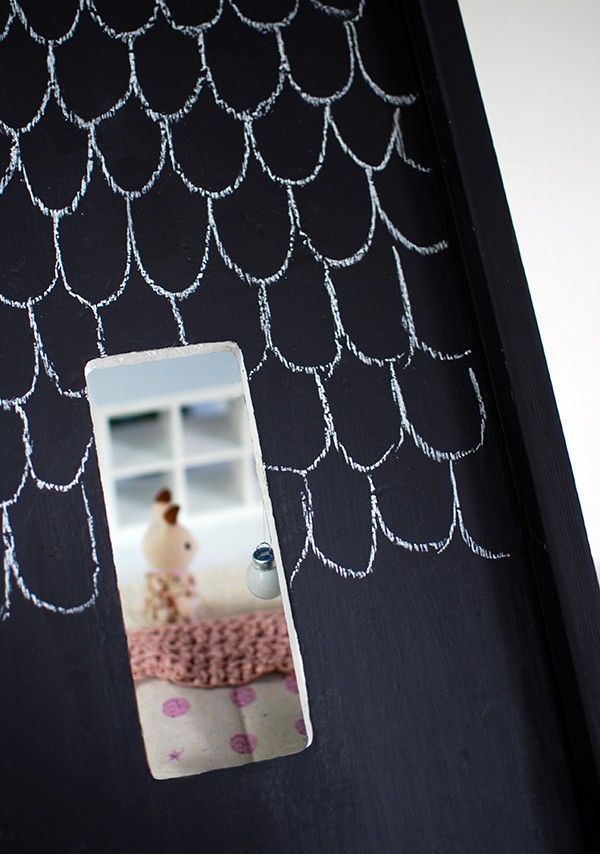 How to make over a doll house with a chalkboard paint roof. Photo by Lisa Tilse for We Are Scout.