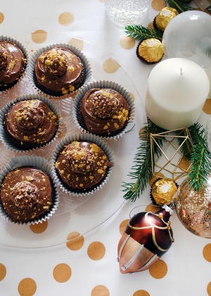 How to make Ferrero Rocher and Nutella cupcakes, dusted with gold flecks - the perfect Christmas treat. Photo by Lisa Tilse for We Are Scout.