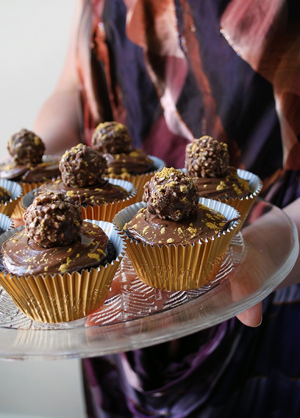 How to make Ferrero Rocher and Nutella cupcakes, dusted with gold flecks - the perfect Christmas treat. Photo by Lisa Tilse for We Are Scout.