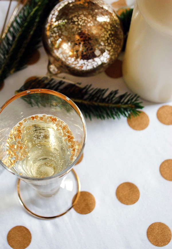 How to set your table with a decadent gold theme - and giant Ferrero Rochers. DIYs and photography by Lisa Tilse for We Are Scout.