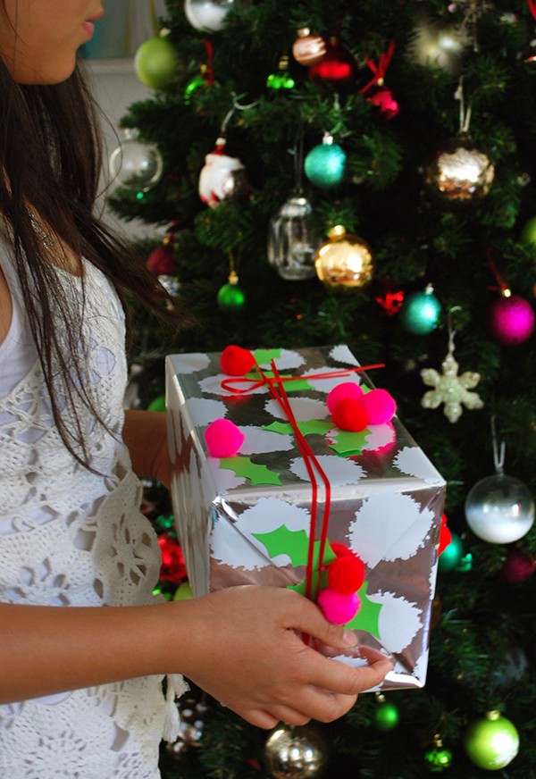 Make your own pom pom holly Christmas gift wrap