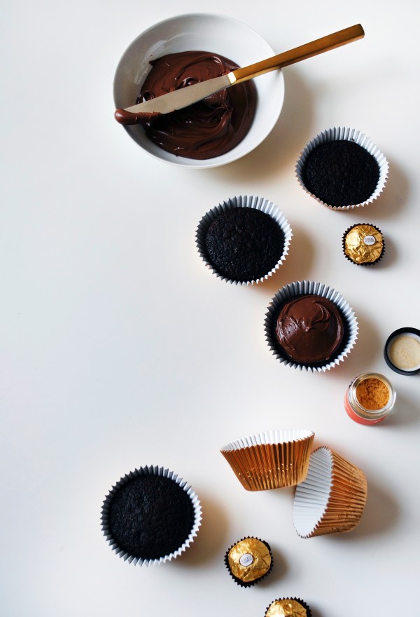 How to make Ferrero Rocher and Nutella cupcakes, dusted with gold flecks - the perfect Christmas treat. Photo by Lisa Tilse for We Are Scout.