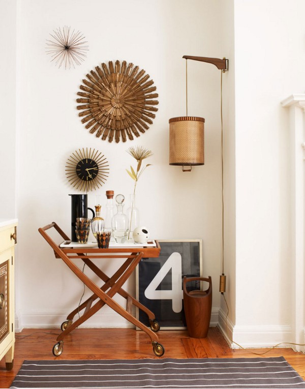 Bar cart styled in a hallway