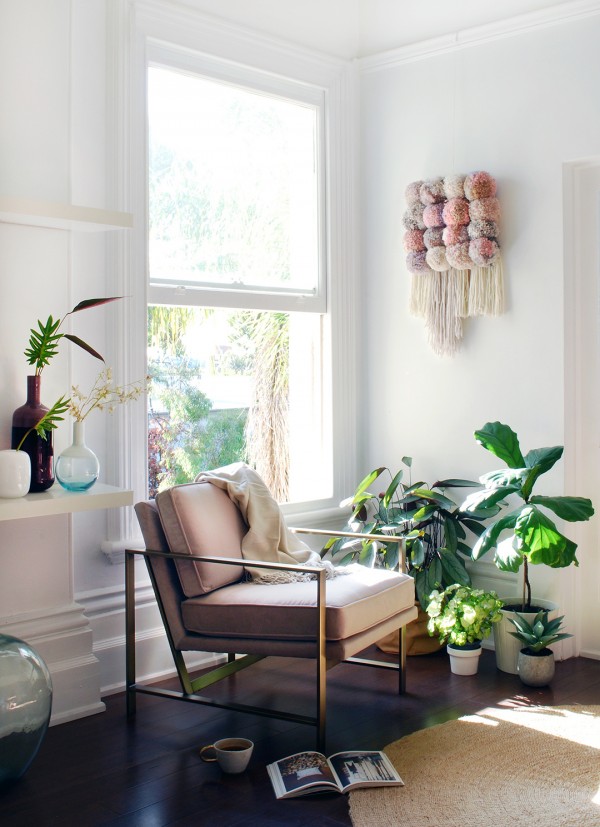 Statement furniture can change a room. Pink velvet arm chair from West Elm