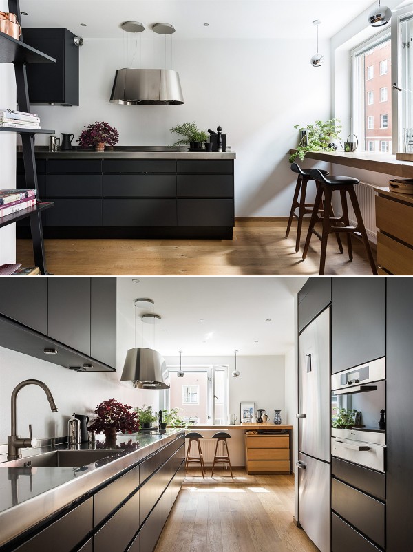 An elegant black kitchen with cafe-style dining area