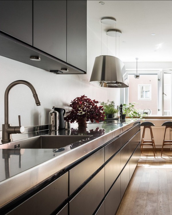 An elegant black eat-in kitchen