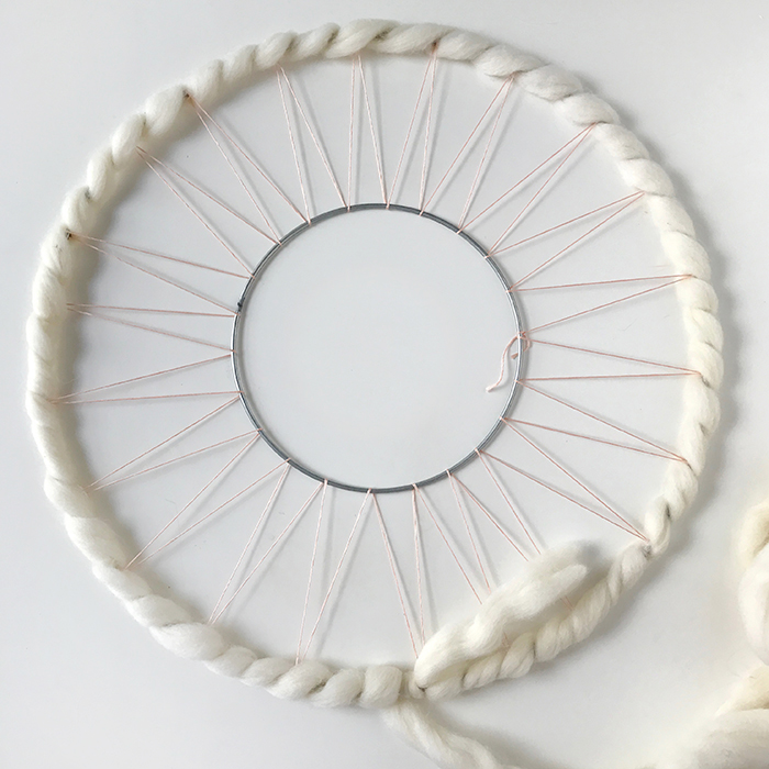 DIY - How to weave a round wall hanging. It's also a modern Christmas wreath!