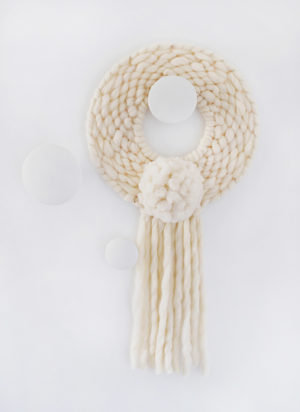 DIY - How to weave a round wall hanging. It's also a modern Christmas wreath!