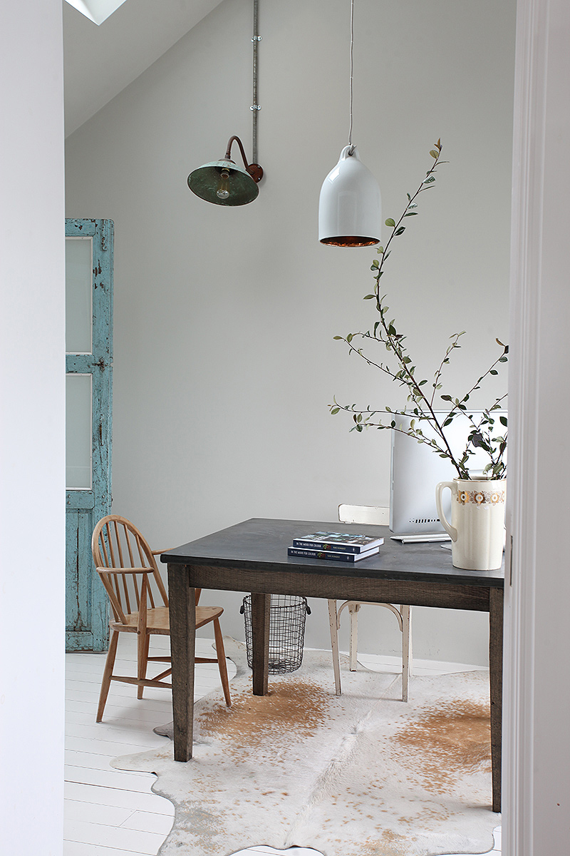 Love this sparse but warm office in a modern bohemian home