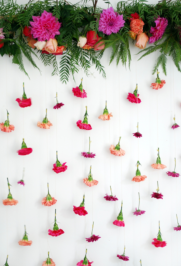 DIY fresh flower garland and photo booth backdrop
