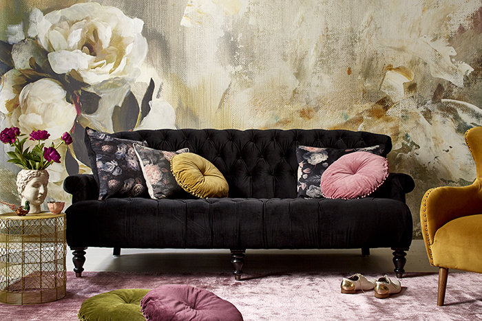 Love this velvet sofa and plush rug