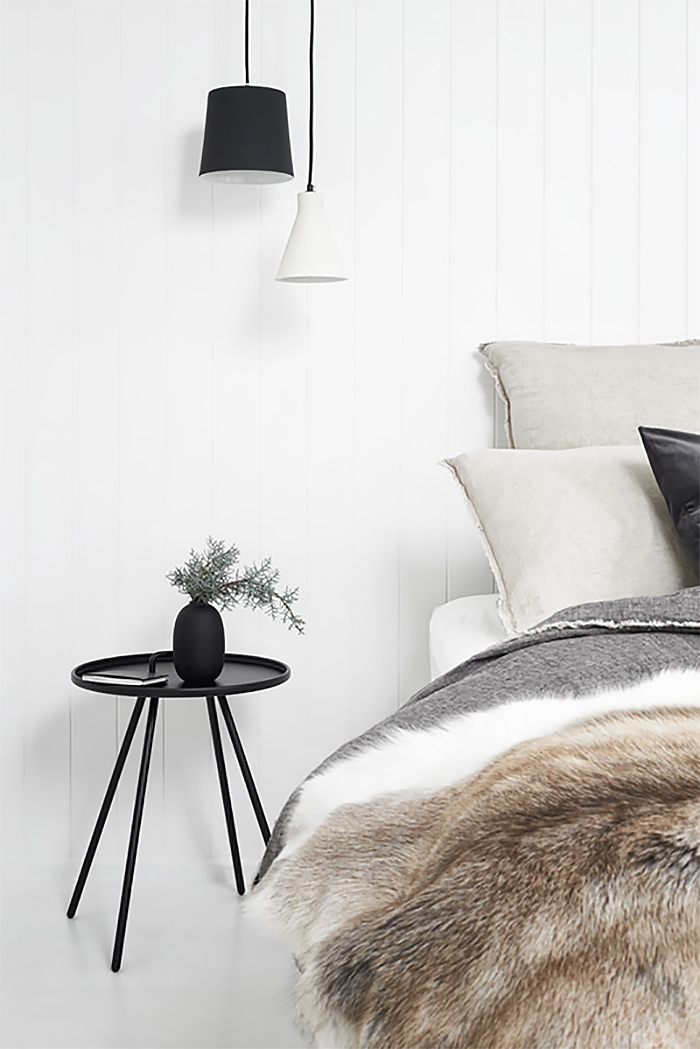 Minimal bedroom bliss in a Scandi style holiday home