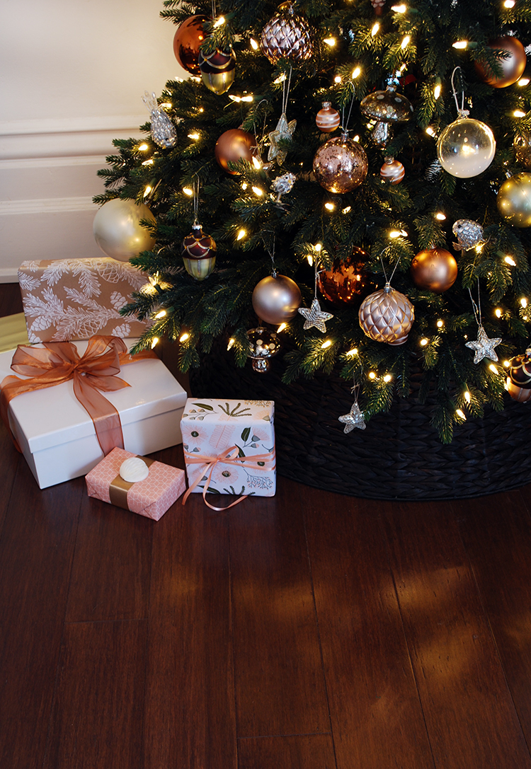 Christmas tree decorations on copper, gold, silver and blush