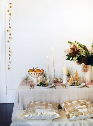 Create a beautiful rose gold table setting with a mid-century edge. Photo by Lisa Tilse for We Are Scout.