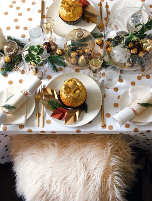 How to set a stunning Christmas table with white and gold accents, vintage glass cloches, and simple DIYS. Photo by Lisa Tilse for We Are Scout.