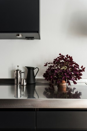 An elegant black kitchen in a Scandinavian apartment